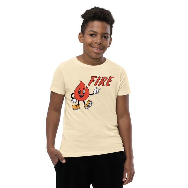 When the fit is 🔥, our retro flame dude throws his hand in the air, tossin' FIRE like he just don't care! The FIRE Youth Tee is perfect for hallway heat, zero scorch marks. Soft hand, street-casual drape, and the confidence boost kids pretend they don’t need (sure, Jan). Pair the FIRE Youth Tee with